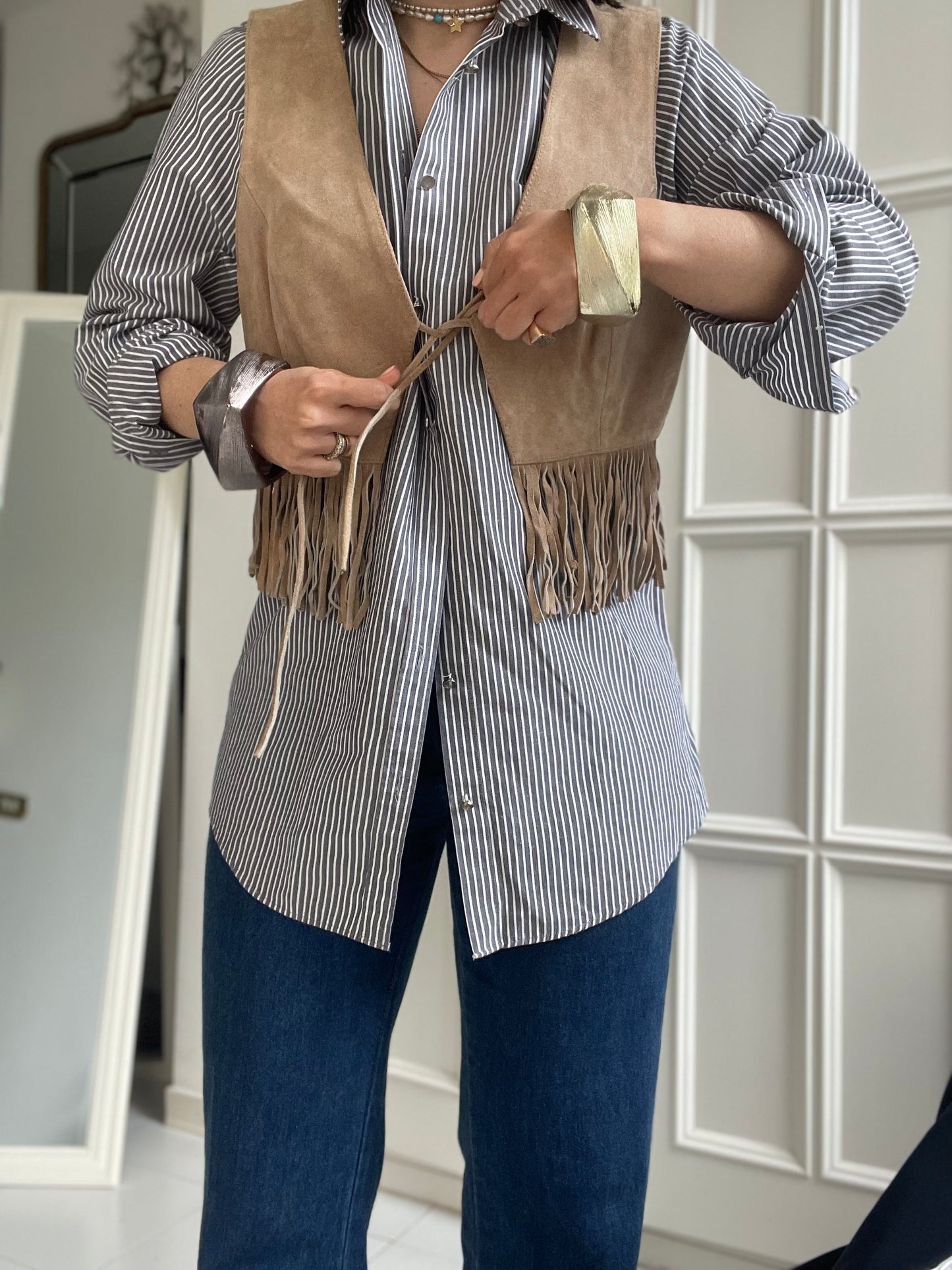 Gilet frange in pelle