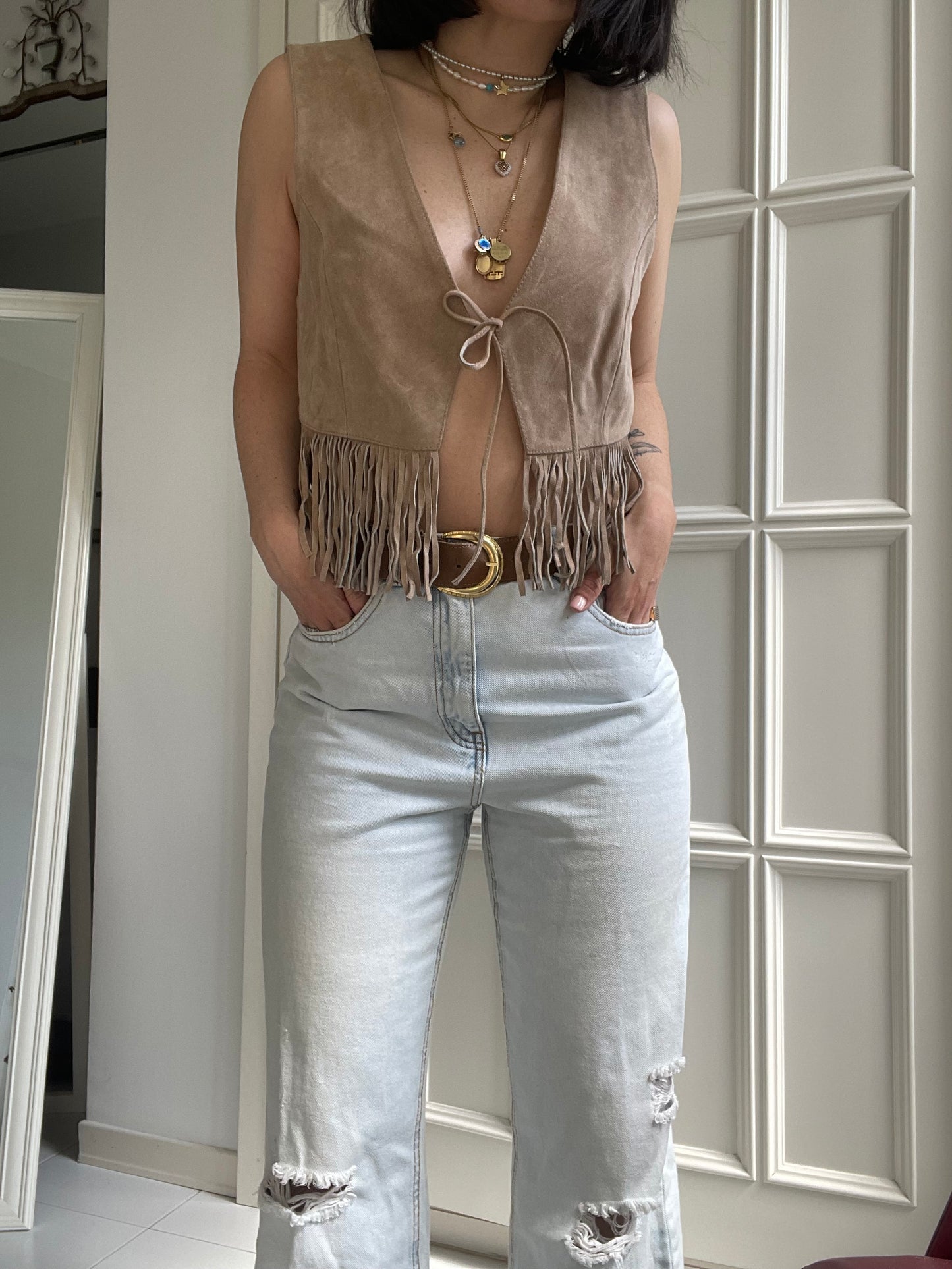 Gilet frange in pelle