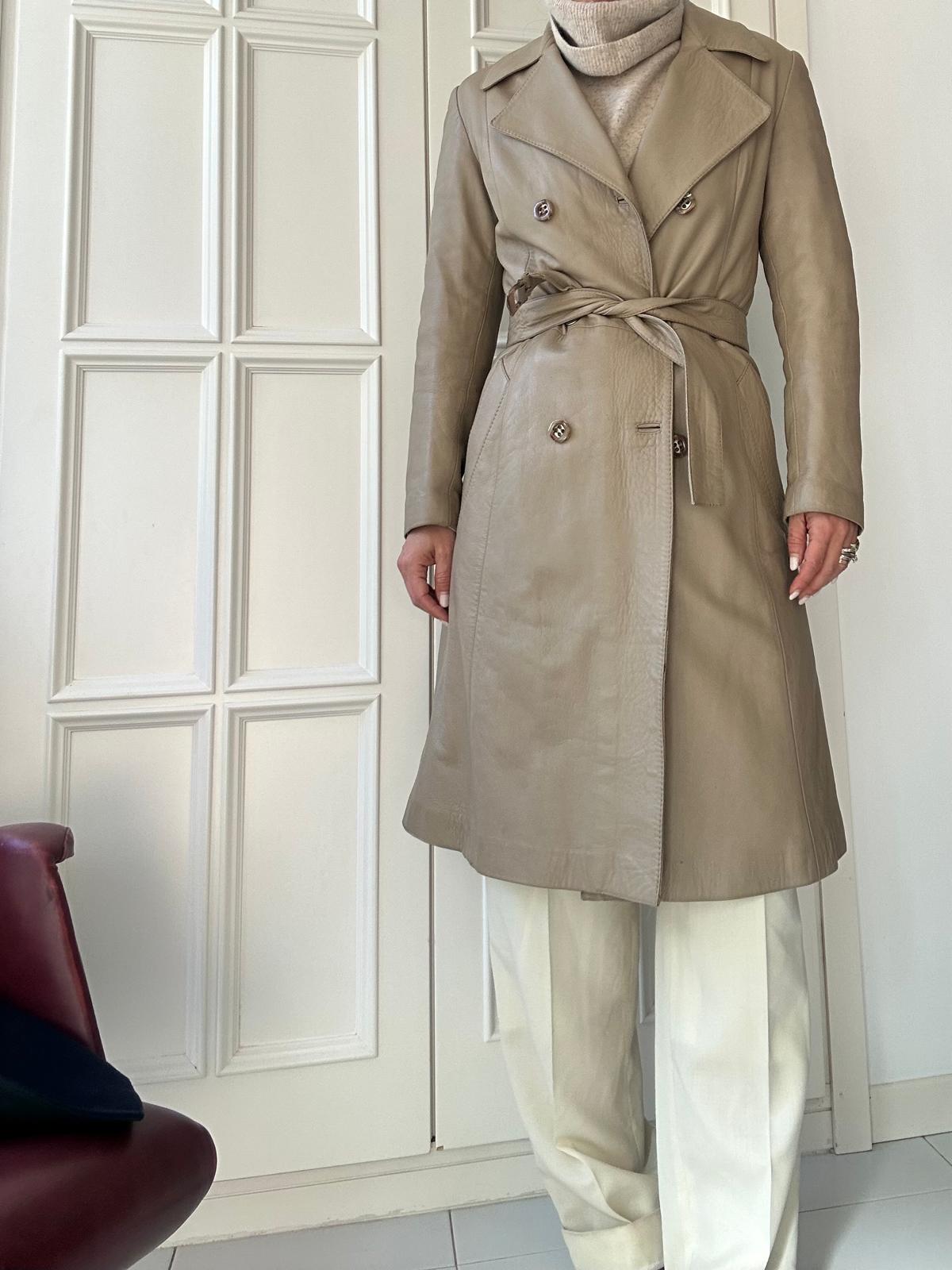 Trench pelle sabbia